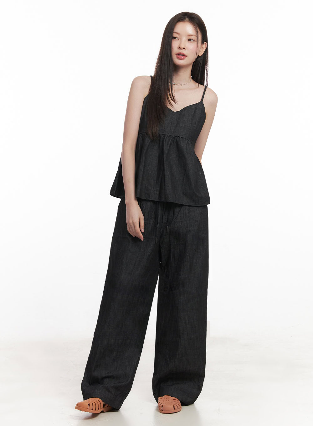 Cotton Denim Wide-Leg Pants IY509 in dark navy, three-quarter front view on model, lightweight cotton denim with banded elastic waist and drawstring, styled with matching denim cami and tan sandals.