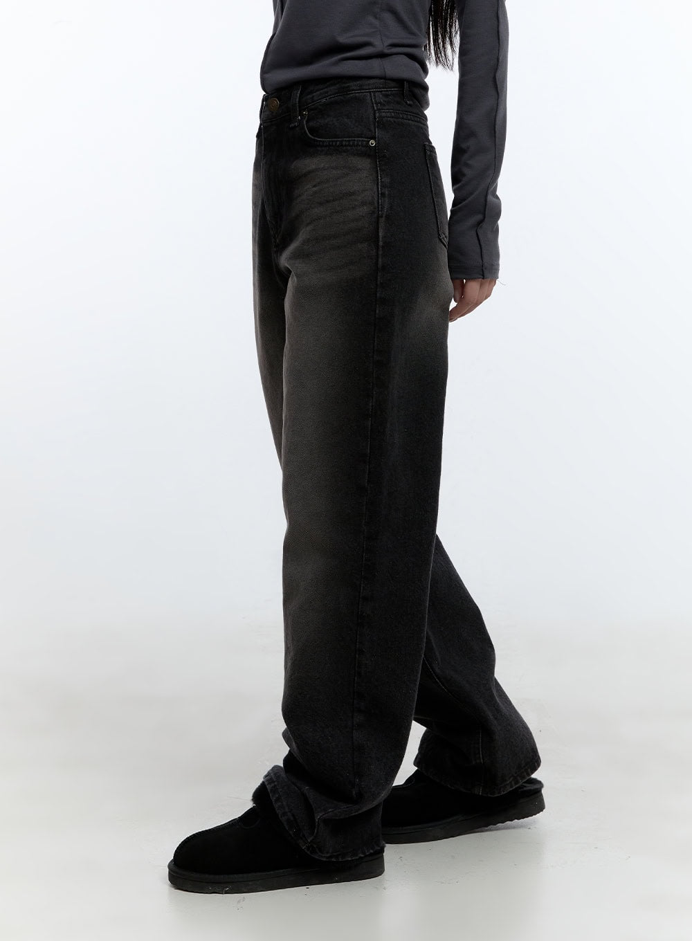 Emilia Cotton Wide Leg Jeans CD420 in black, side view on model, washed cotton denim showing wide leg volume and length, paired with grey long-sleeve top and black shearling shoes.