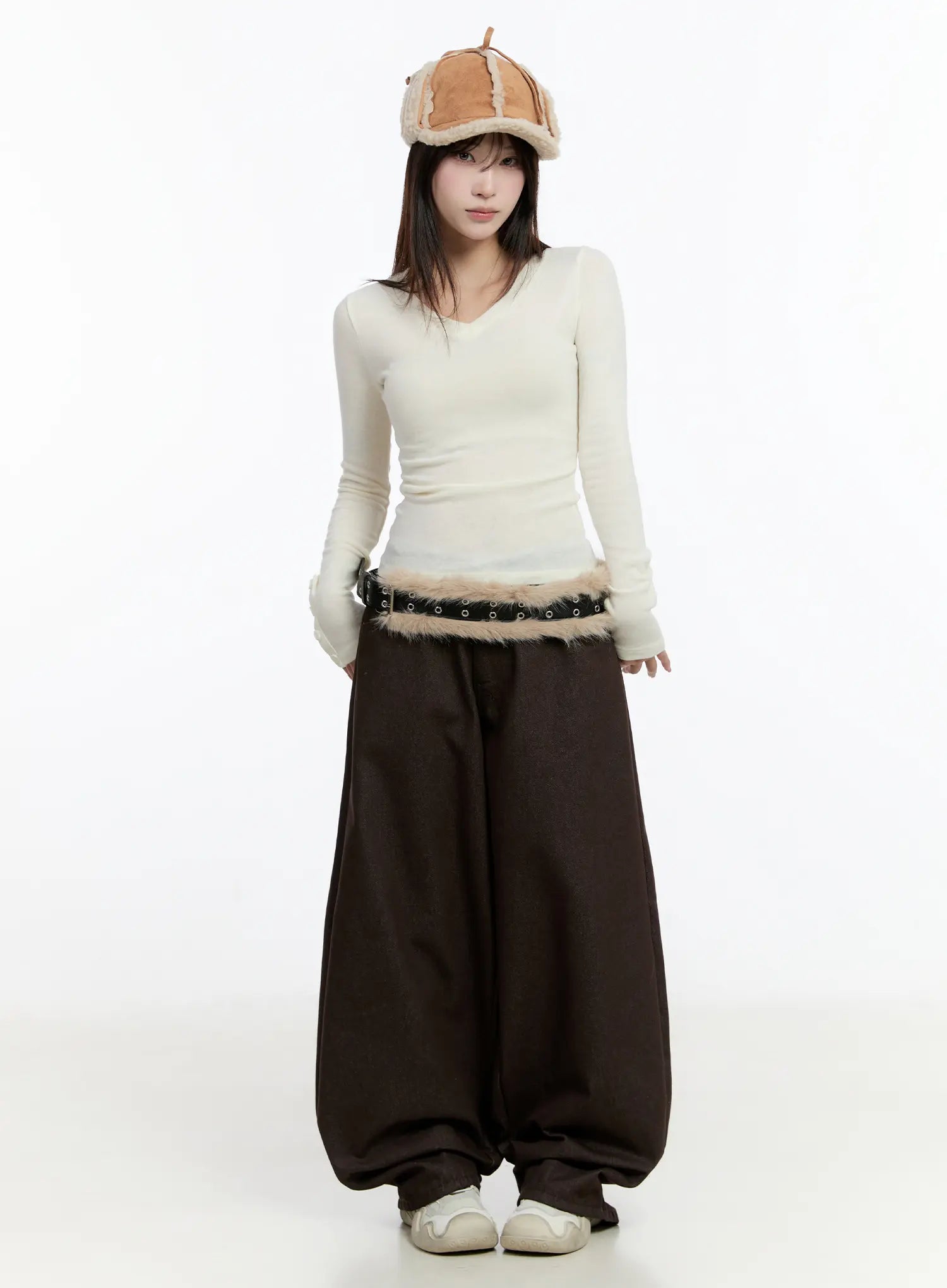 Emely Wide Leg Jeans CN524 in dark brown, full front view on model, oversized balloon-leg denim with banded waist, paired with white ribbed top and fur-trim belt.