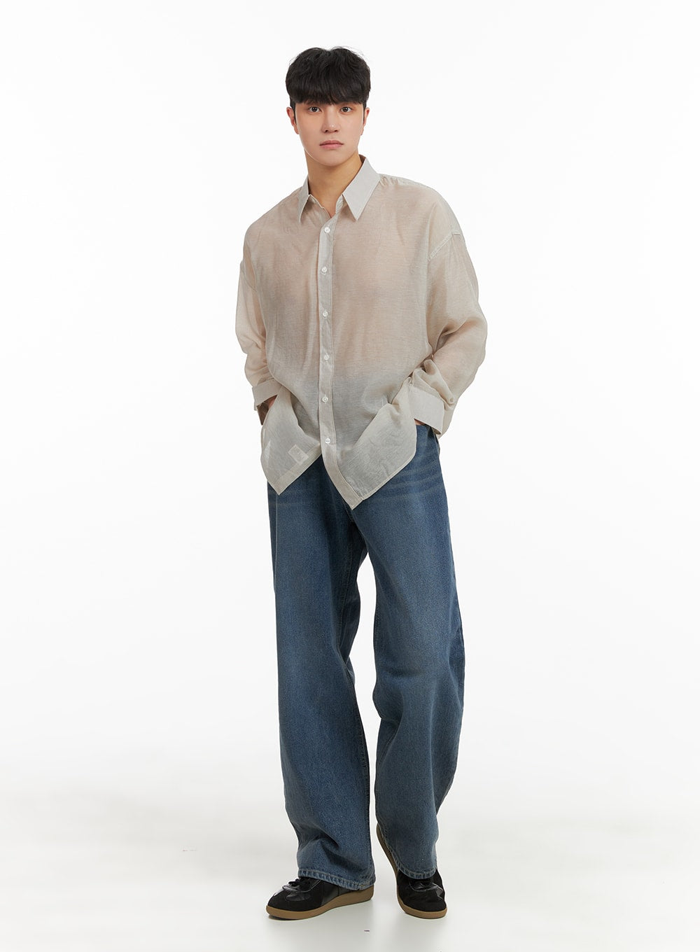 Men's Washed Denim Wide Fit Jeans IA402 in blue, full front view on model, wide straight leg silhouette, styled with beige sheer button-up shirt and black sneakers.