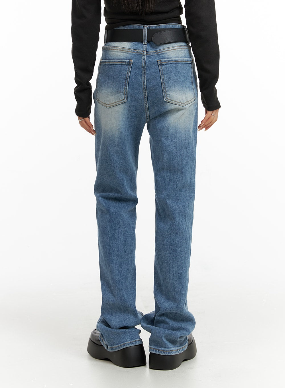 Washed Slim Fit Bootcut Jeans CF415 in light blue, back view on model, showing rear pockets and washed fading detail, slim fit through hip with slight bootcut flare at hem.