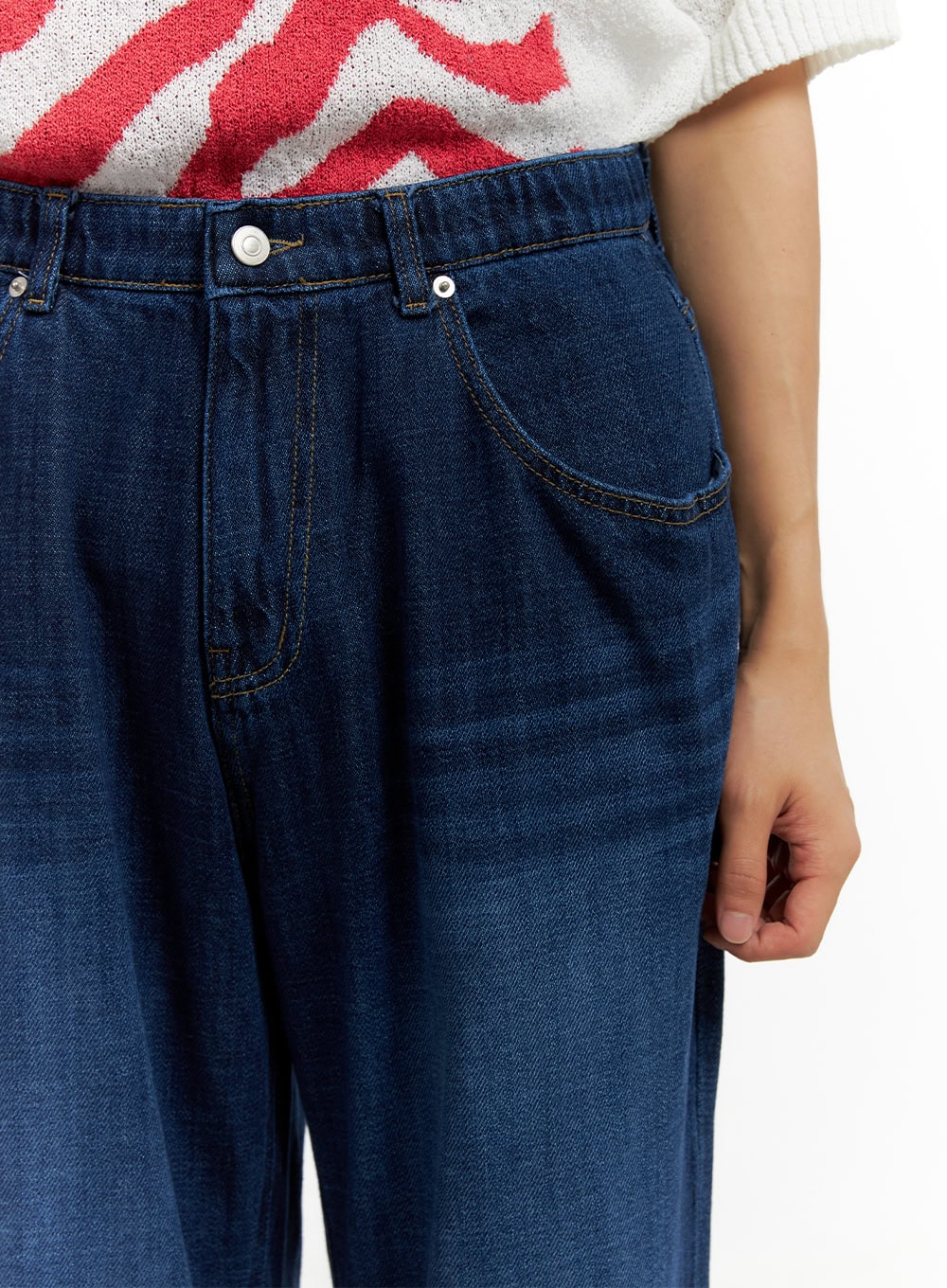 Men's Washed Cotton Denim Jeans CL429 in dark blue, close-up detail of waistband and front pocket, elastic waist, single button closure, coin pocket with contrast stitching.