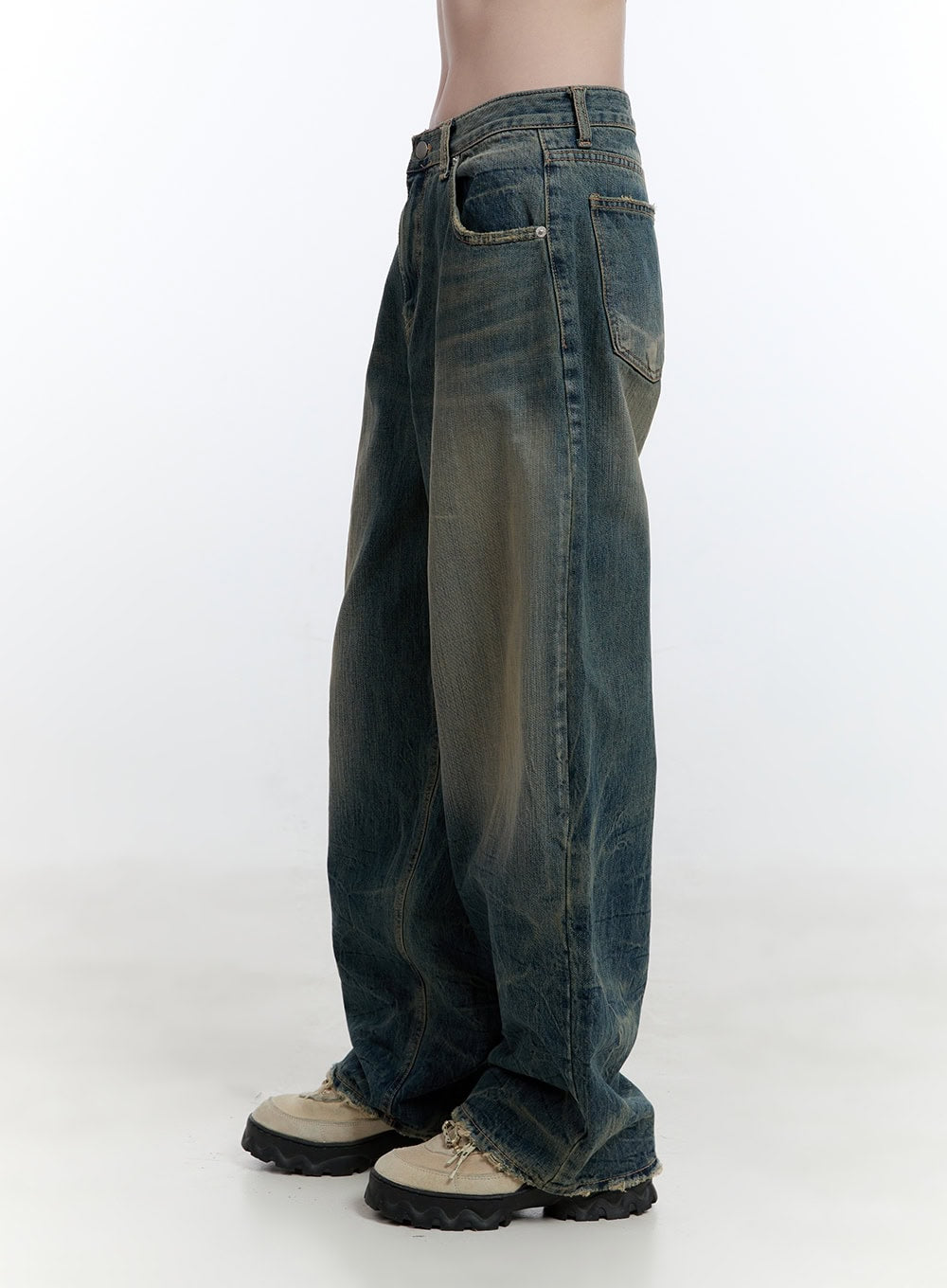 Danielle Vintage Washed Baggy Jeans CJ522 in blue, side view product shot, showing voluminous wide leg, faded wash gradation, crinkled denim texture, and frayed raw hem.