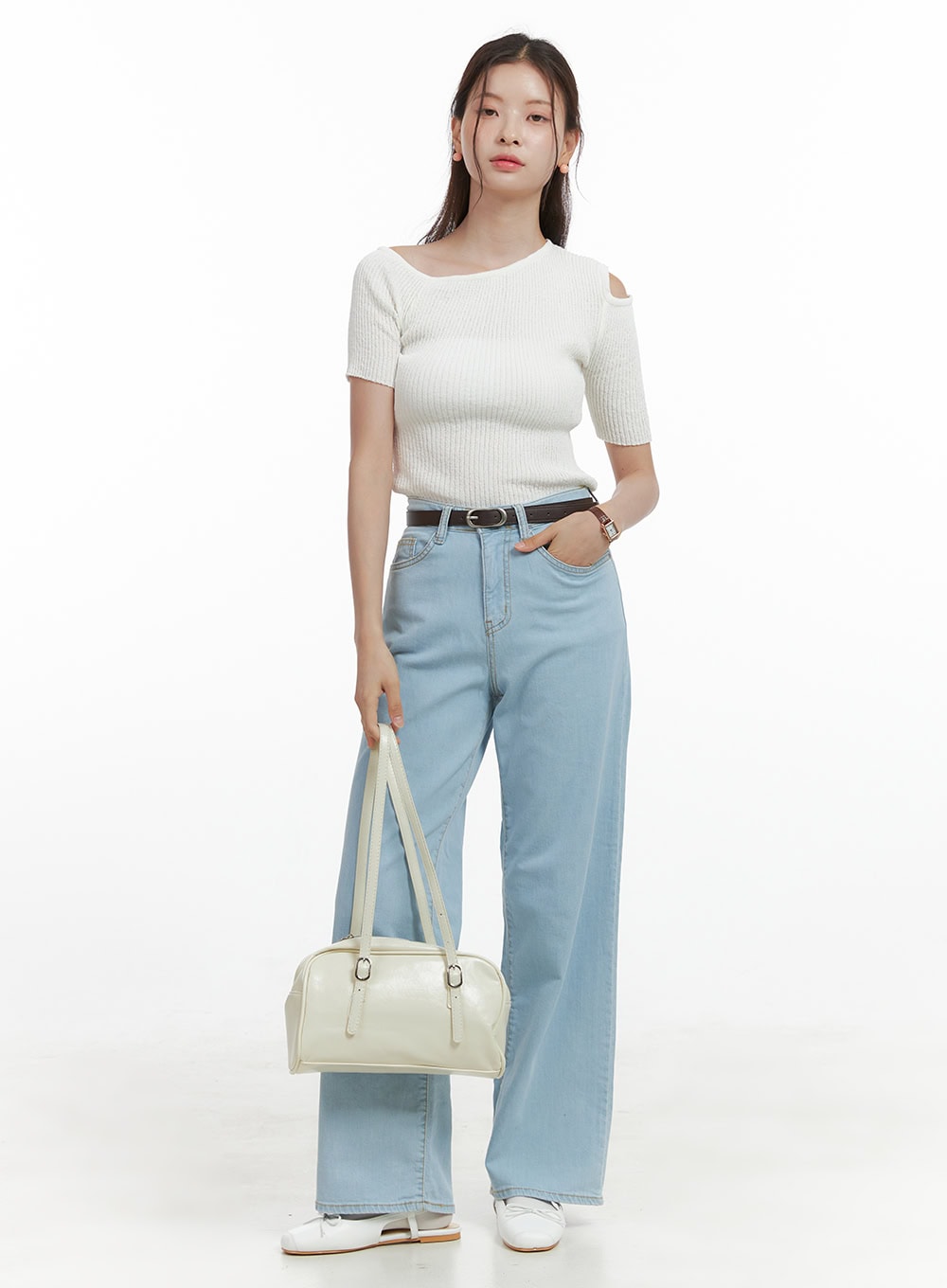Washed Low Rise Loose Straight Jeans OL416 in light blue, front full-body shot on model, straight-fit washed cotton denim with belt, styled with white ribbed knit top and cream shoulder bag.