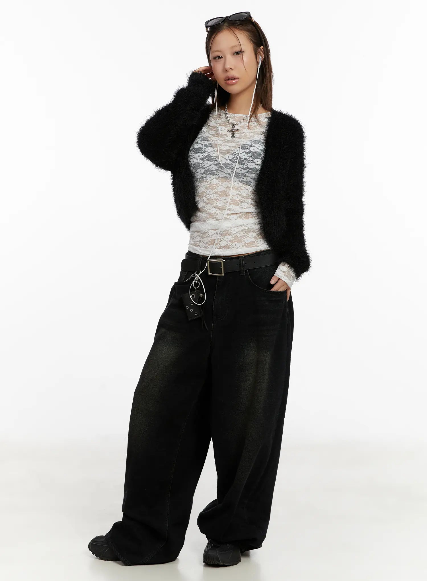Myla Dark Wash Wide-Leg Jeans CD512 in dark black wash, front three-quarter view on model, wide-leg silhouette with washed fading, paired with black fuzzy cardigan and white lace top.