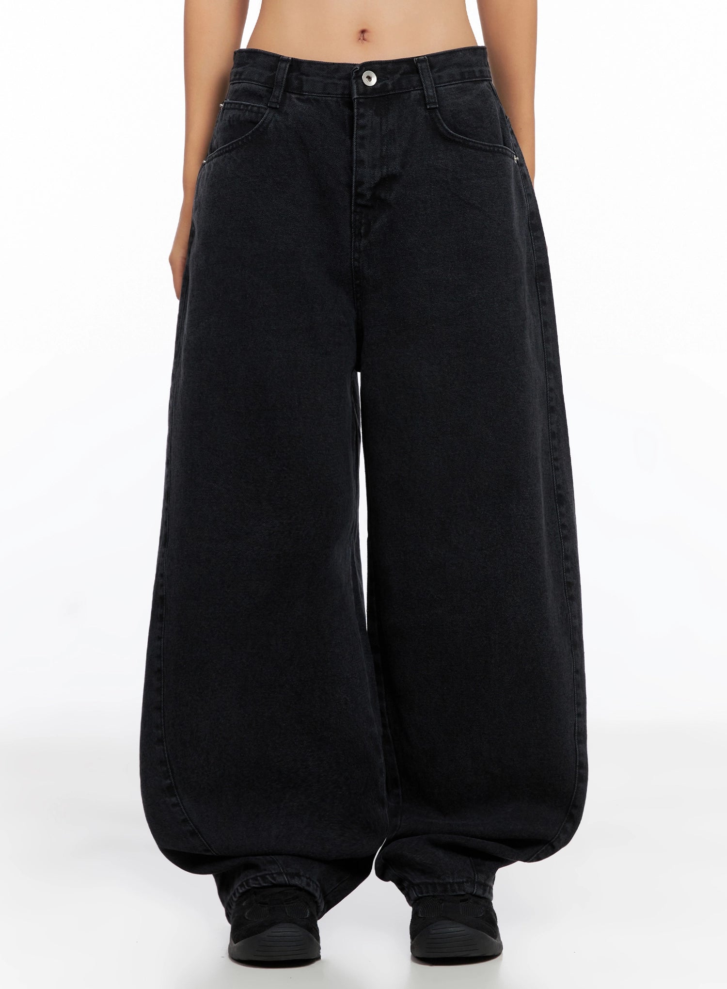 Sunwoo Embroidered Wide Leg Jeans IG528 in black, front full-length worn shot, extreme wide-leg baggy cotton denim silhouette, low rise with side pockets, pooling at hem over sneakers.