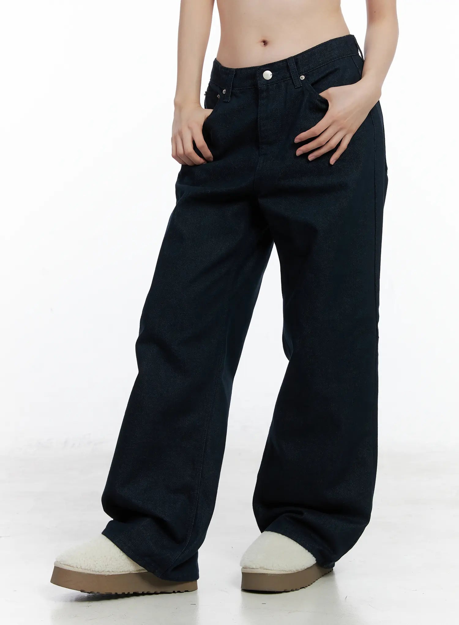Drew Non-Fade Relaxed Fit Wide Jeans CN519 in dark blue, close-up front waist view on model, low-rise fit with silver button, front pockets, non-fade solid cotton denim.