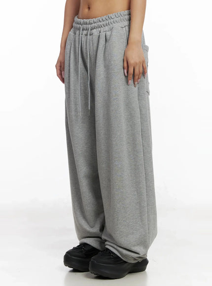 studded-cross-baggy-sweatpants-iy501