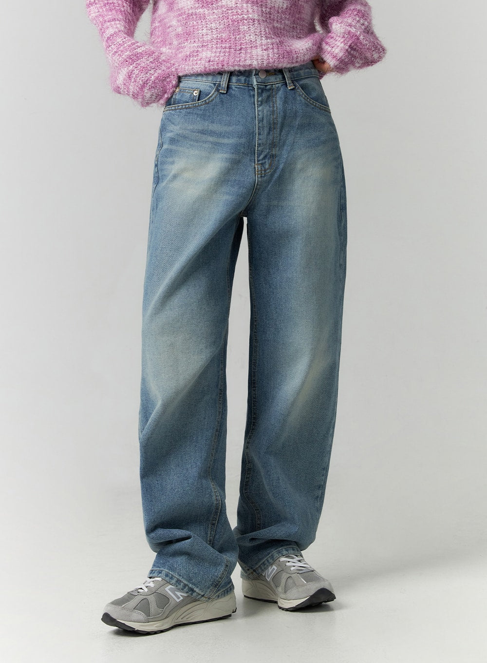 Straight Fit Jeans CN324 in blue, waist-to-hem close-up on model, washed denim with front coin pocket, belt loops, and wide straight leg, worn with pink sweater.