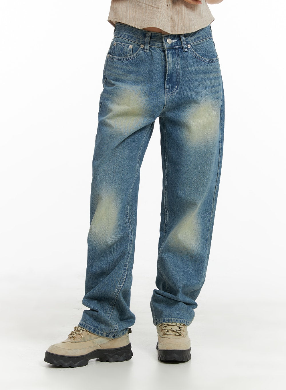 Recycled Washed Jeans (Unisex) CM425 in blue, front mid-shot on model, straight-leg silhouette with sun-faded wash at thighs, worn with chunky lug-sole sneakers.