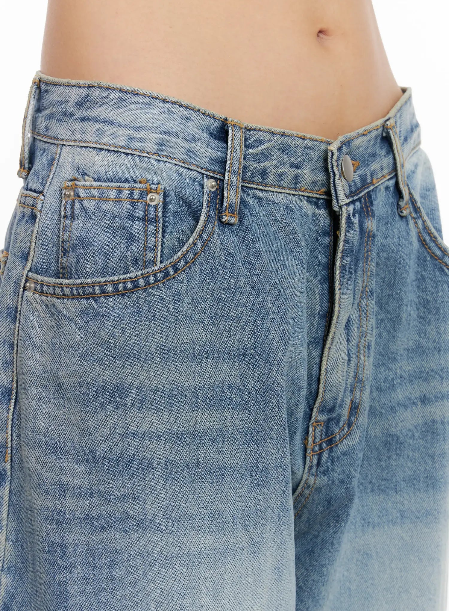 Koko Vintage-Wash Baggy Jeans CL528 in blue, close-up detail of waistband and front pockets, showing vintage-wash cotton texture and gold-tone rivets.