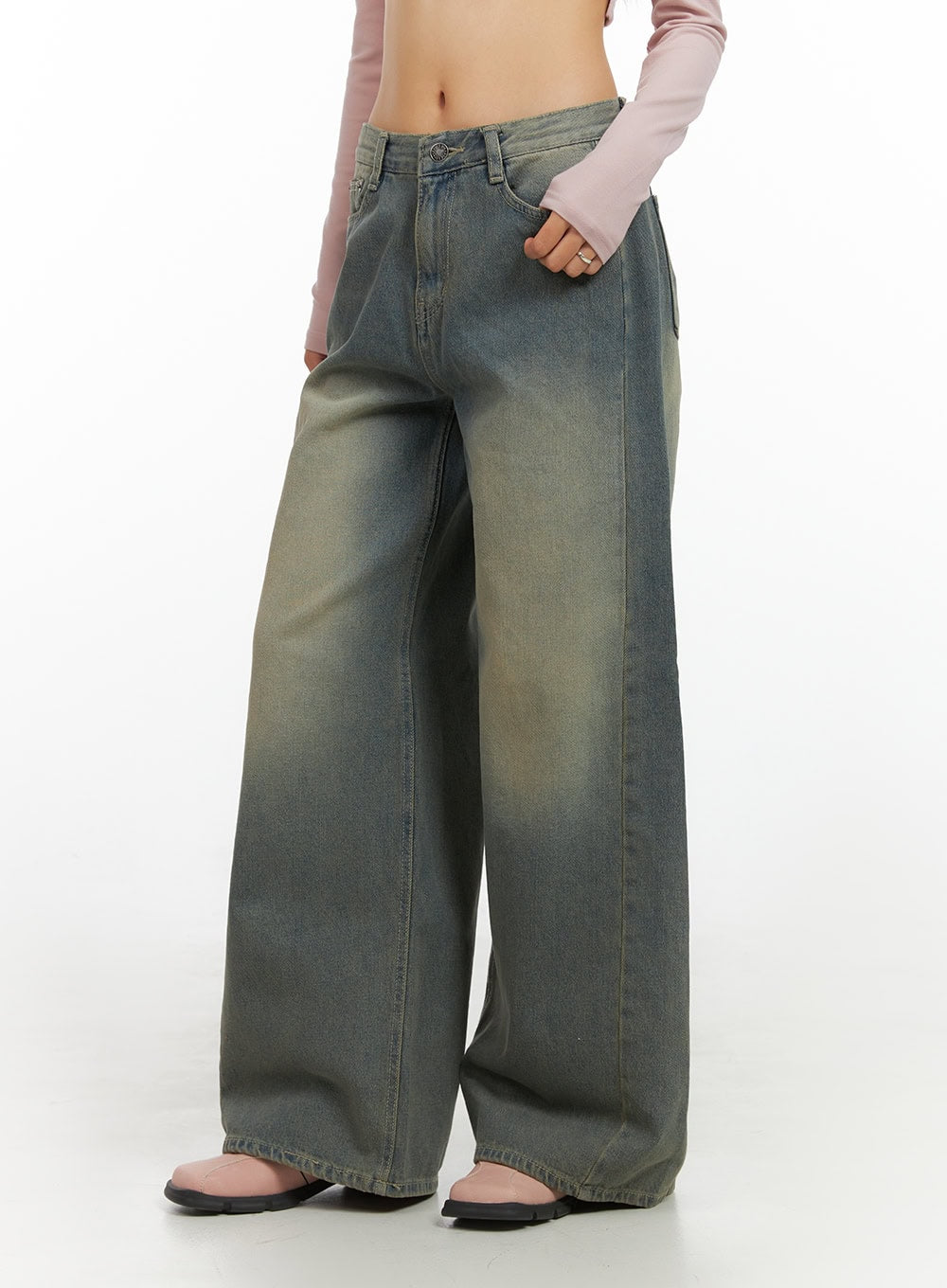 Inez Washed Denim Wide Leg Jeans IS427 in vintage green, front close-up on model, low-rise waistband with button fly, washed denim texture and wide-leg cut visible.