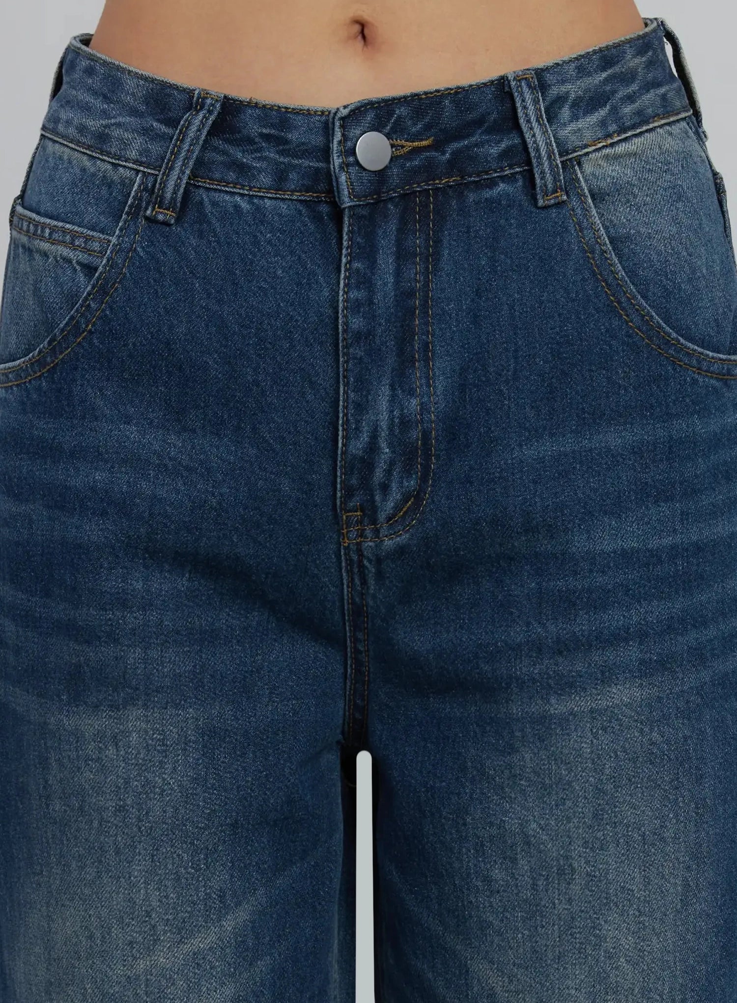 Alaina Wide Leg Jeans IJ508 in dark blue, close-up detail of waistband and front pockets, silver button closure, contrast topstitching on washed cotton denim.