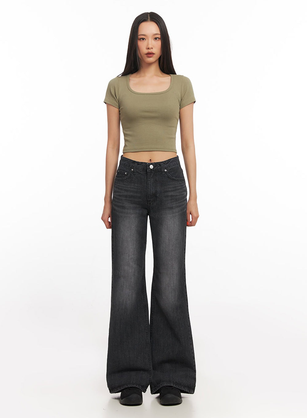 Joanna Washed Flared Jeans IA504 in washed black, front view on model, no accessories, high-rise waist with silver button detail, slim leg flaring to wide hem, paired with olive crop top.