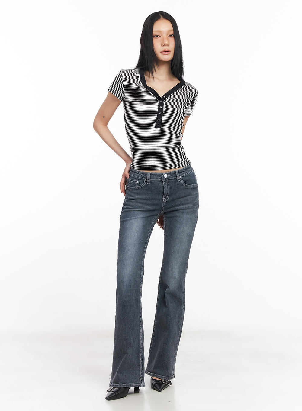 Nadeline Slim Bootcut Jeans CY528 in dark gray, full-body front shot on model standing straight, slim fit washed denim bootcut, paired with striped henley crop top and black heels.