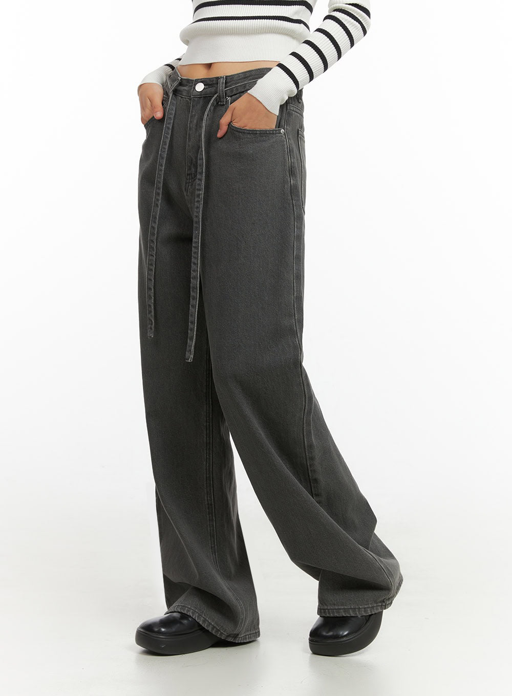 Emery Cotton Strap Baggy Jeans IO409 in dark gray, close-up side view on model, highlighting high waist, dangling fabric strap detail, and wide-leg cotton denim cut.