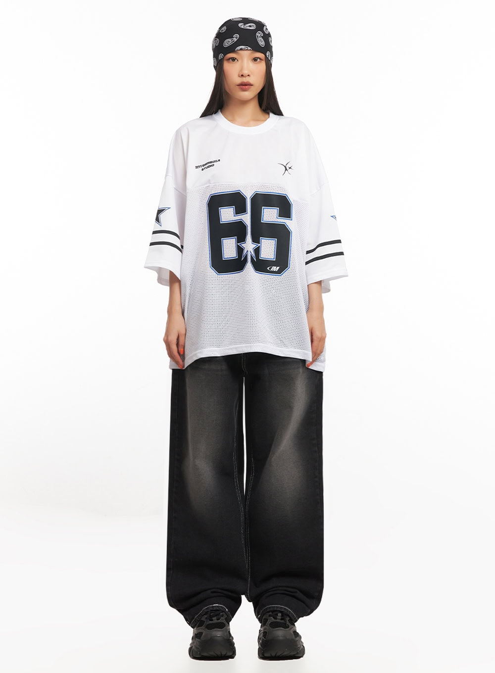 Alexis Stitched Wide-Leg Jeans IA504 in washed black, front full-body on model, relaxed wide-fit washed cotton denim with contrast stitch detail, styled with oversized mesh jersey top.