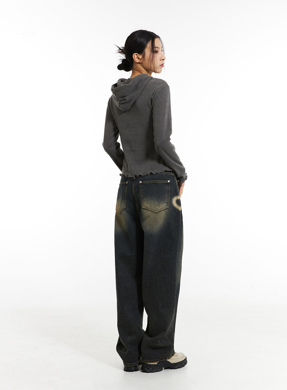 Heart-Bleached Wide Leg Jeans IN308 in dark blue, back view on model, showing dual back pockets with vintage wash, bleached heart detail visible on side, paired with grey cropped hoodie.