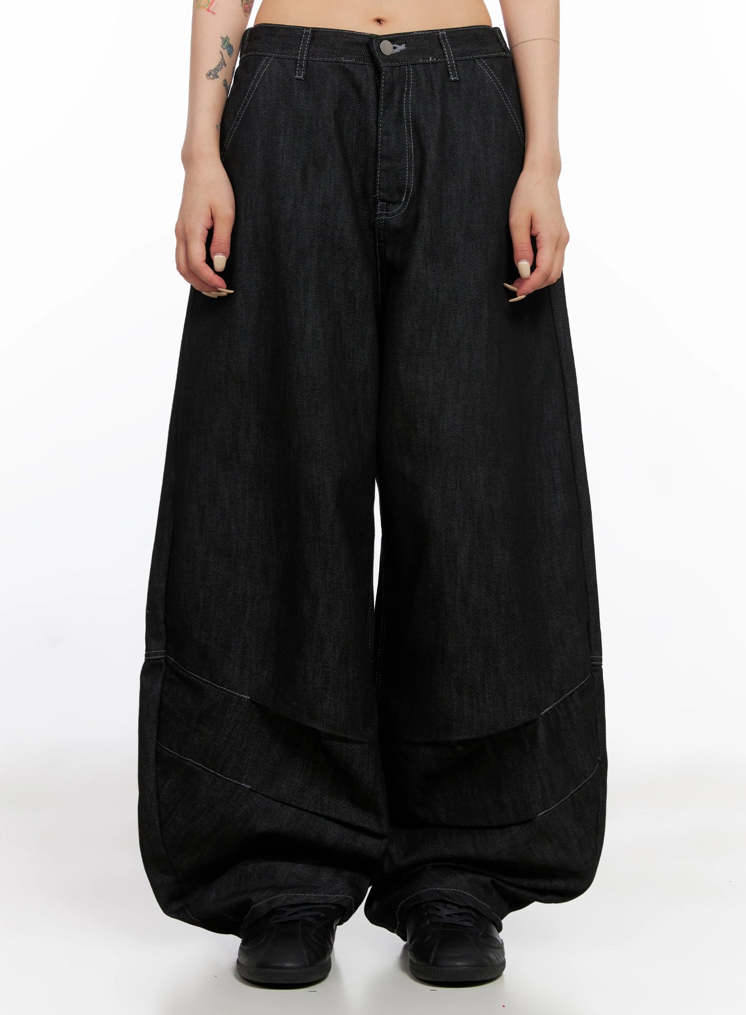 Leyla Pin-Tuck Wide-Leg Jeans IS515 in black, front view on model, arms at sides showing balloon-volume wide leg, pintuck seam lines and contrast topstitching throughout.