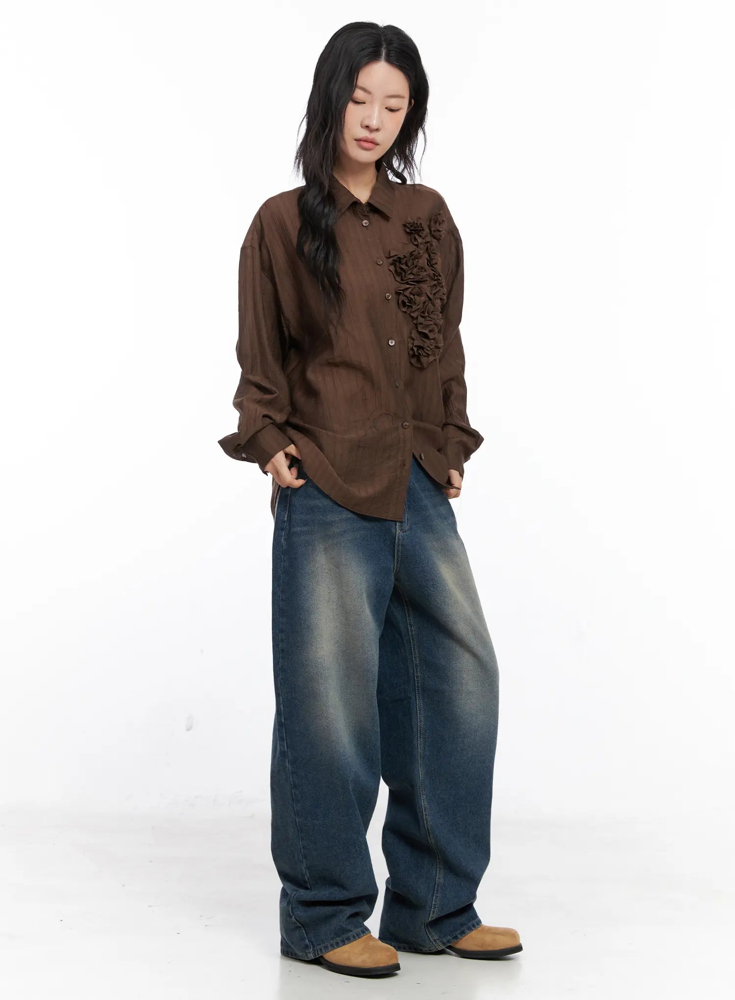 Xyla Vintage Pocket Baggy Jeans CO507 in blue, three-quarter front styling shot on model, baggy washed denim with brown ruffled shirt tucked loosely, tan boots.