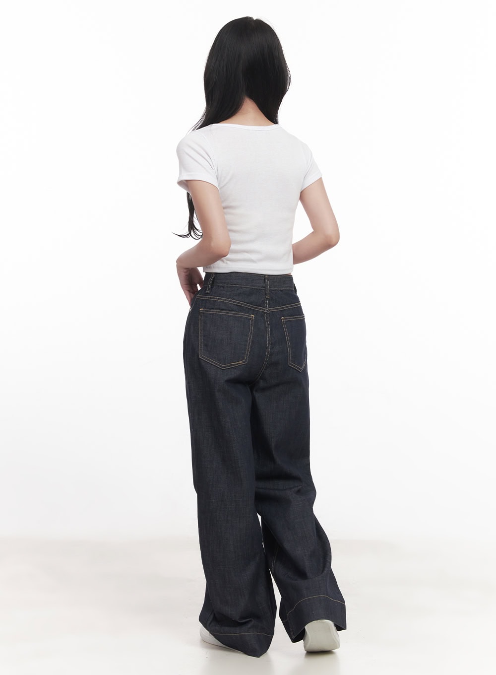Seline Non-Fade Wide-Leg Jeans CA510 in dark blue, full back view on model, back patch pockets with contrast stitching, wide-leg cotton denim, styled with white crop tee.