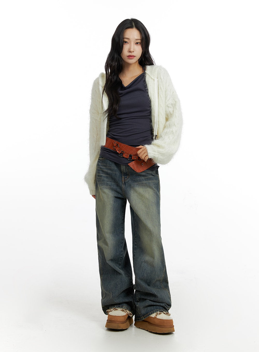 Washed Baggy Jeans CF416 in dark blue, full-body front on model, styled with cream fuzzy cardigan, dark tank, brown belt bag, and platform shoes.