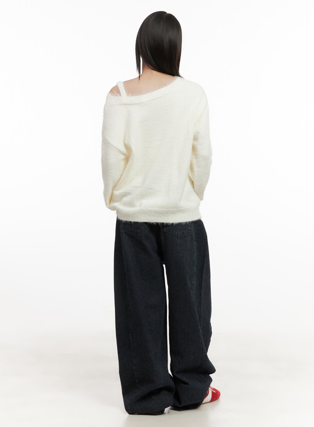 Comfortable Striped Wide-Leg Pants CD425 in dark blue, back full-body view on model, wide-leg cotton with vertical stripe texture and back pockets, worn with off-shoulder white knit and red sneakers.