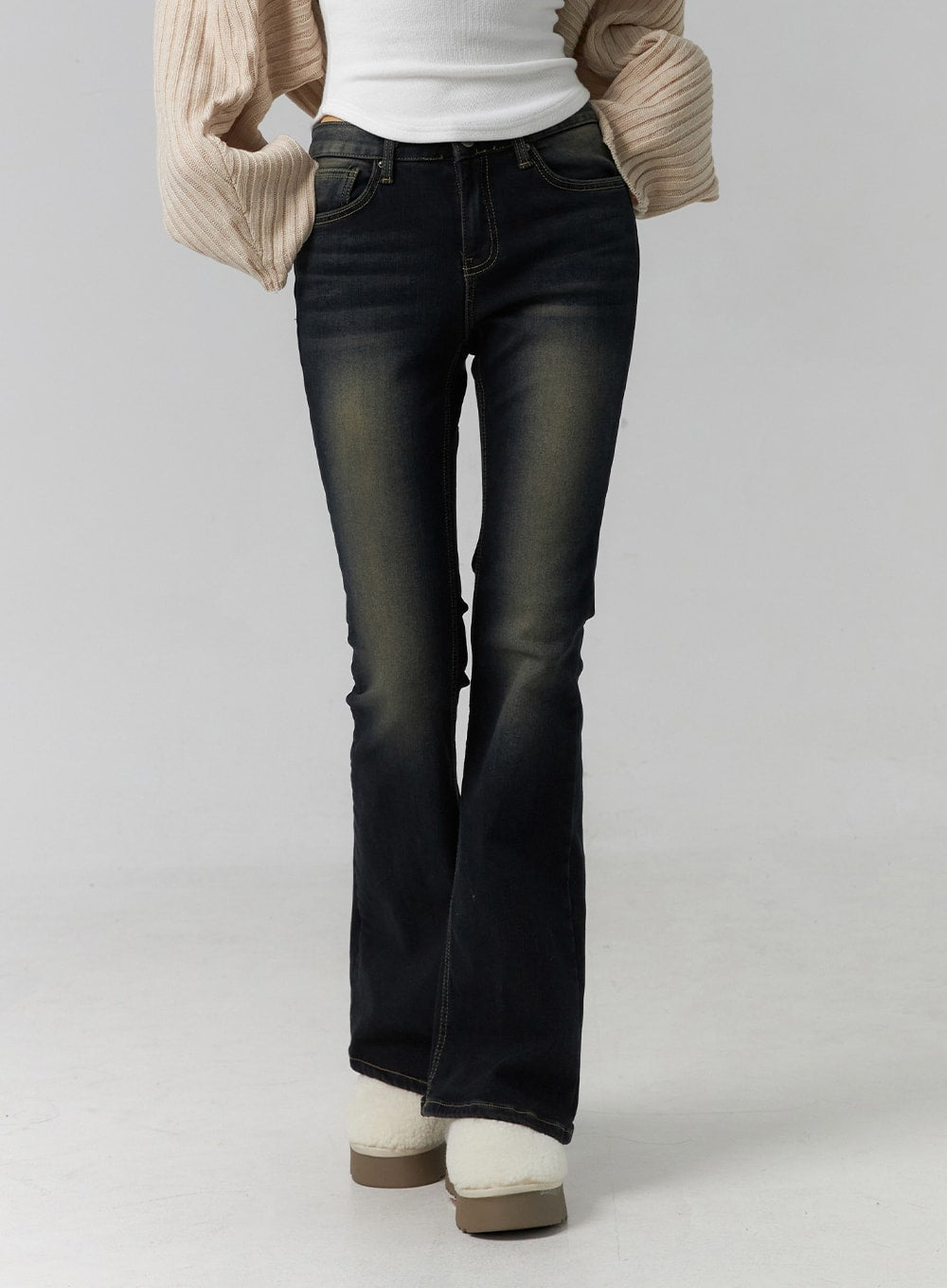 Washed Low Rise Bootcut Jeans CD308 in dark blue, front waist-to-hem close-up on model, low-rise five-pocket detail with golden contrast stitching and vintage faded wash denim.