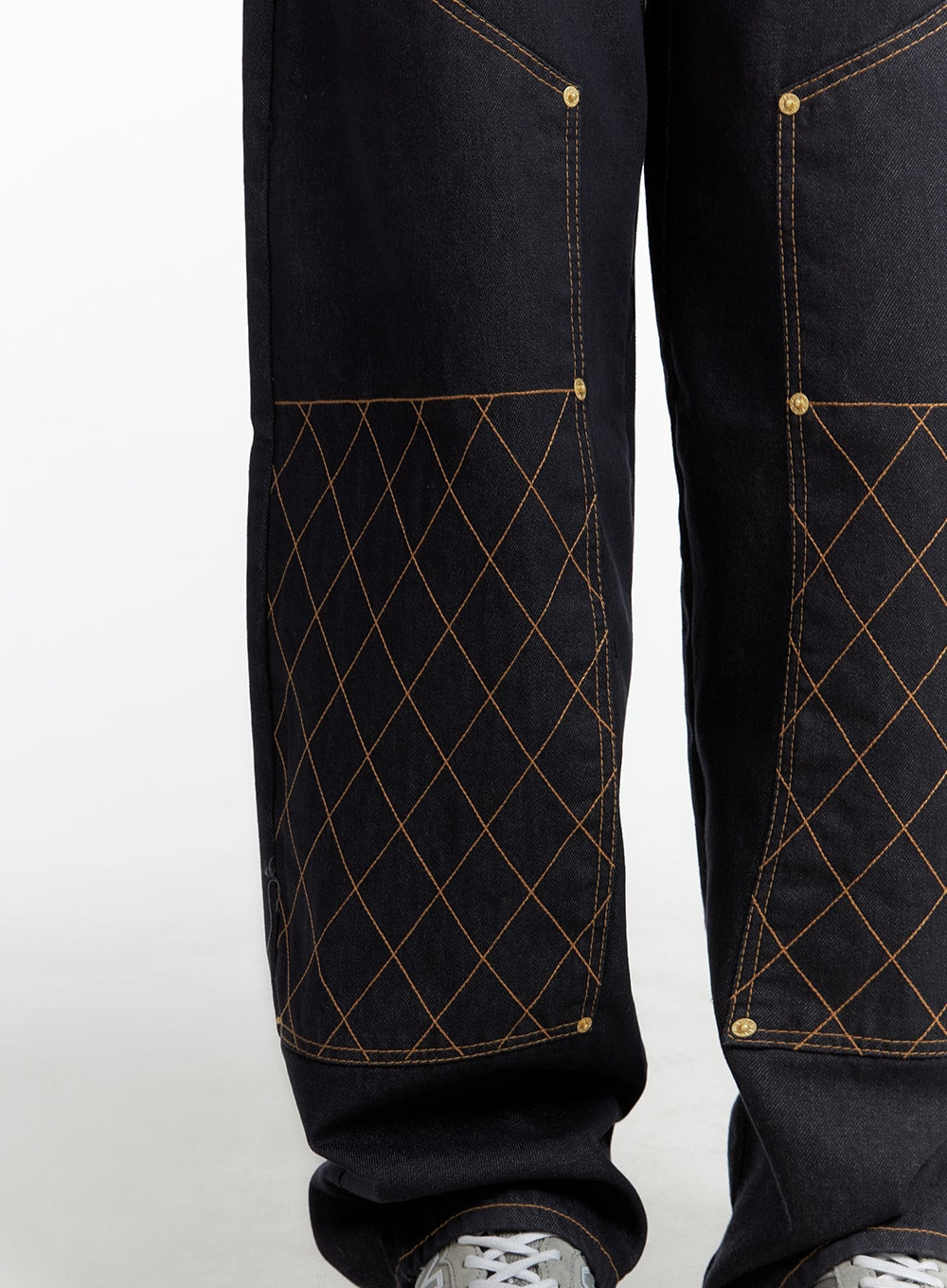 Stitched Wide Denim Jeans CF408 in dark navy, close-up detail shot of lower leg, highlighting diamond argyle contrast stitch pattern and gold rivet accents on wide-leg denim panels.
