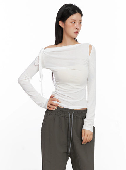 assymetric-cut-out-long-sleeve-top