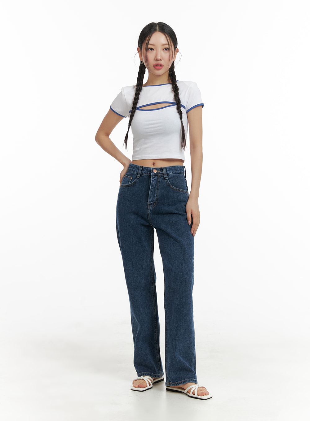 Recycled Straight Fit Jeans OM428 in dark blue, front full-body shot on model standing straight, washed cotton denim with relaxed straight fit, paired with white cut-out crop tee.