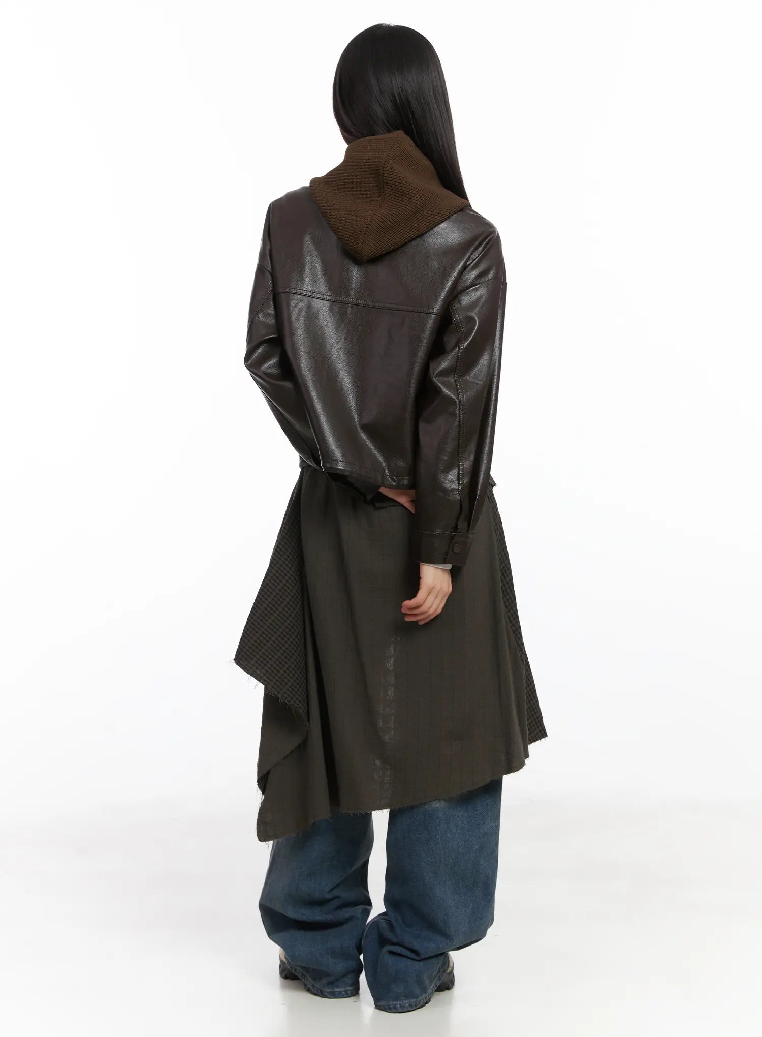 Miriam Wide Leg Jeans CD519 in blue, back full-length view on model, wide voluminous leg and washed finish shown beneath asymmetric layered skirt and hooded leather jacket.