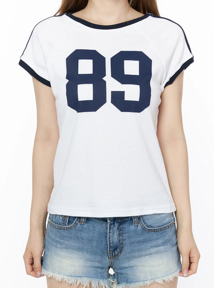 89-graphic-raglan-short-sleeve-top-cu511
