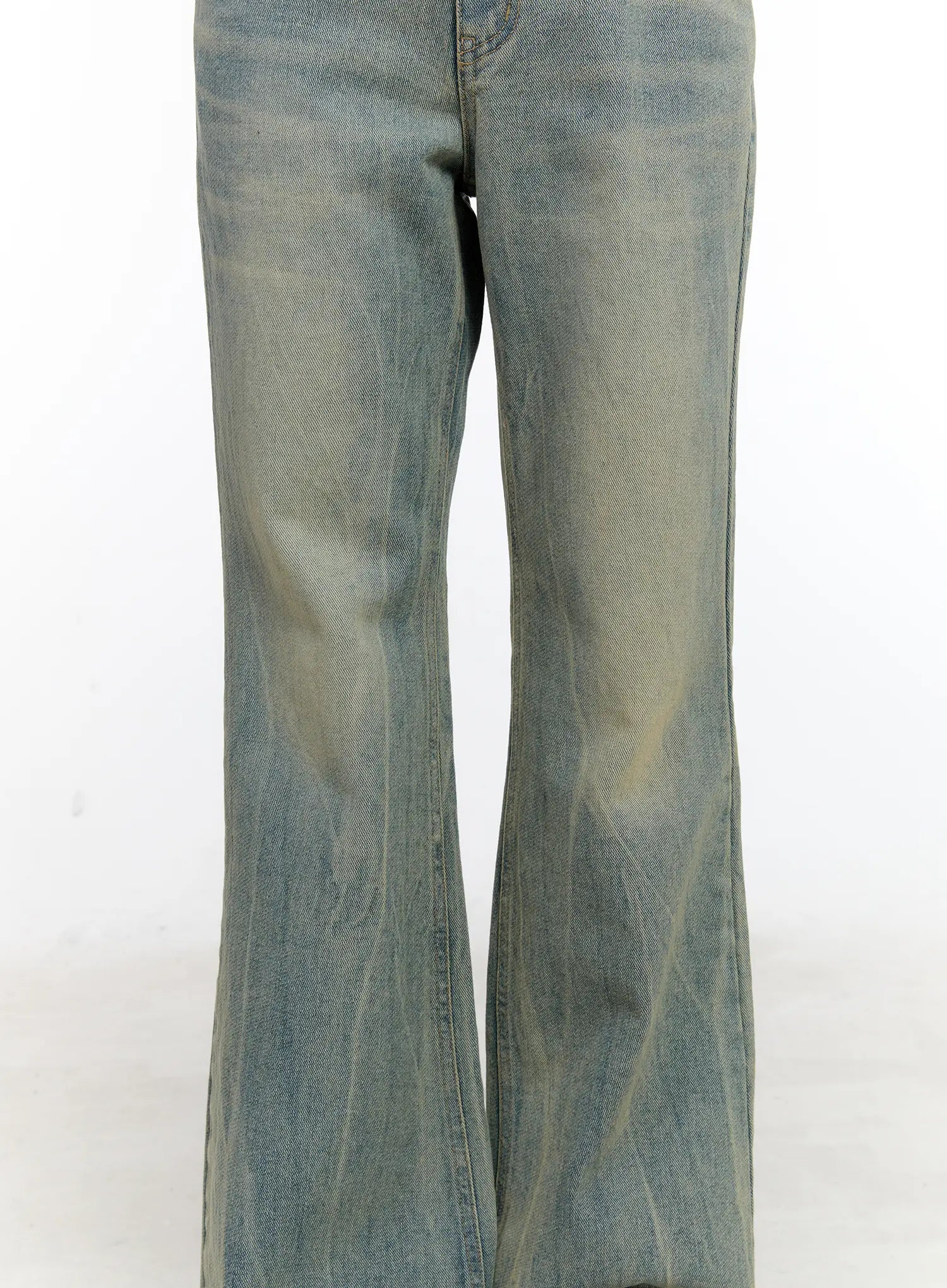 Roa Vintage Blue Flared Denim Jeans CL504 in blue, close-up detail shot of leg and flared hem, highlighting vintage yellow-tinted wash, whisker creases, and wide bootcut silhouette on denim.