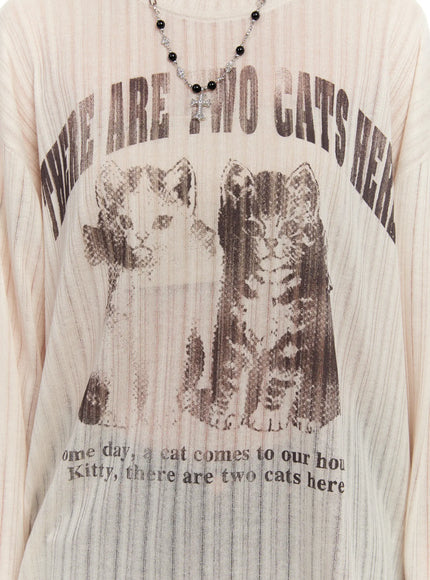 graphic-oversized-sheer-long-sleeve-top-cs530