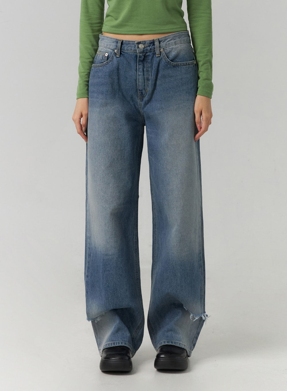 Ripped Straight Leg Jeans CD308 in blue, waist-to-hem front close-up on model, washed cotton denim with five-pocket construction, low-rise waistband, and frayed ripped hem.