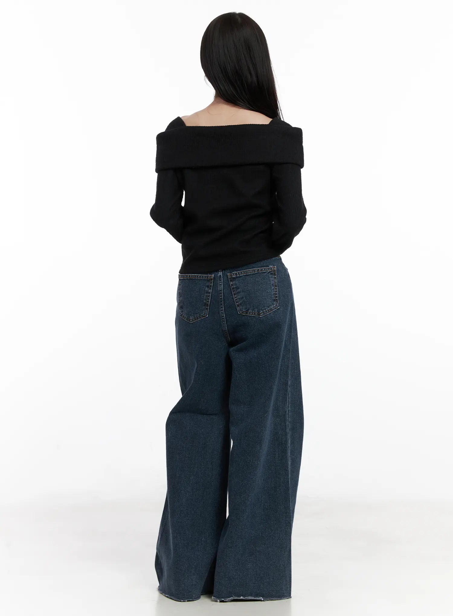 Louisa Ultra Wide Flared Jeans CN527 in dark blue, back full-length view on model, showing dual back pockets with contrast stitching and flared wide leg, styled with black off-shoulder knit.
