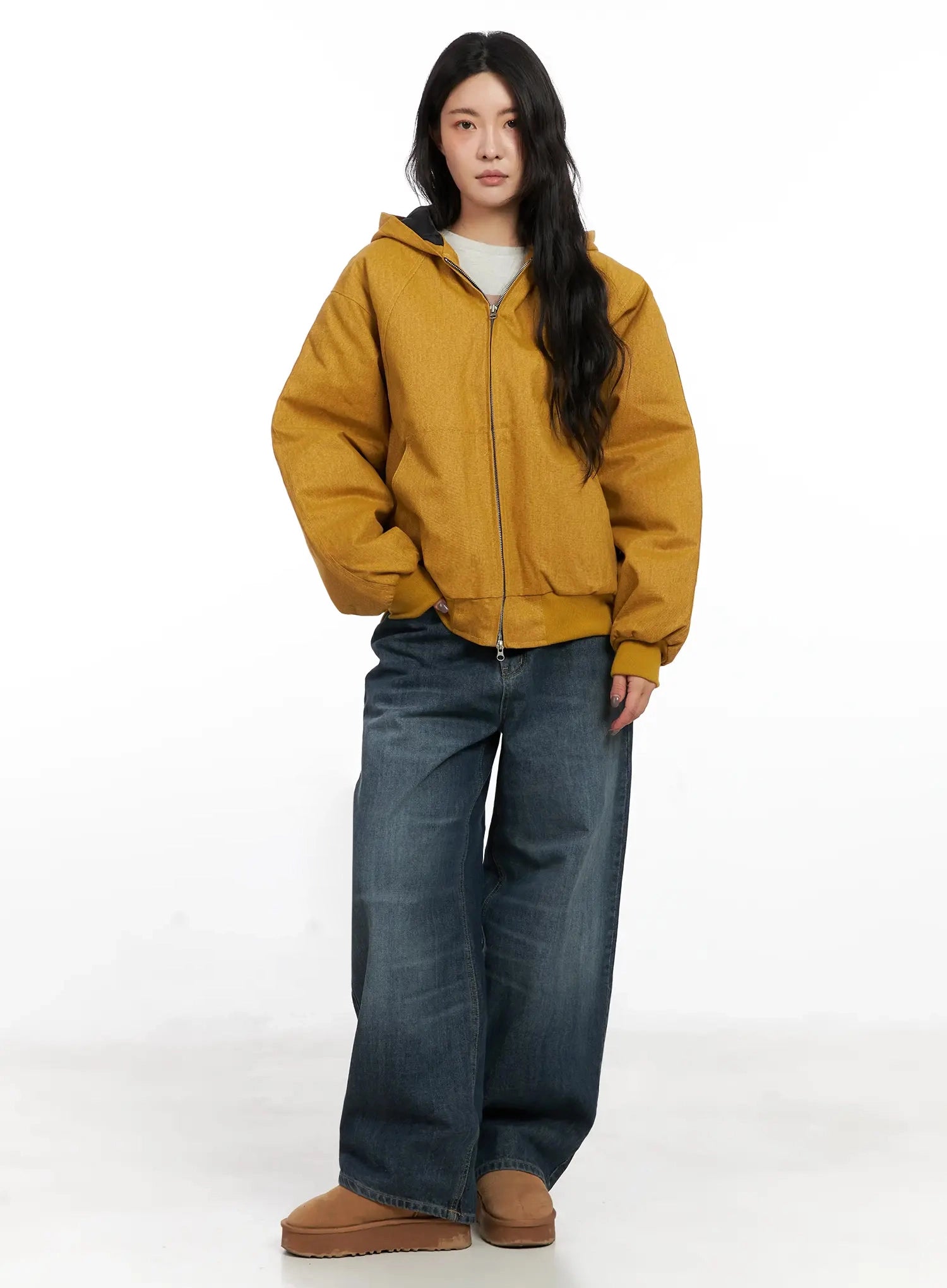 Regina Contrast Stitch Baggy Jeans IN528 in dark blue wash, full front view on model, relaxed wide-leg washed denim with belt loops, styled with mustard hoodie and tan UGG boots.