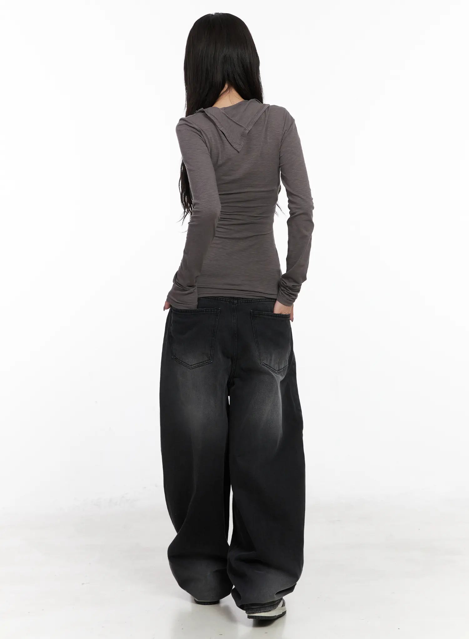Yuji Dark-Washed Baggy Jeans CN513 in black, back view on model, showing dual back pockets with contrast stitching, dark-washed faded cotton denim, extremely wide leg silhouette pooling at hem.