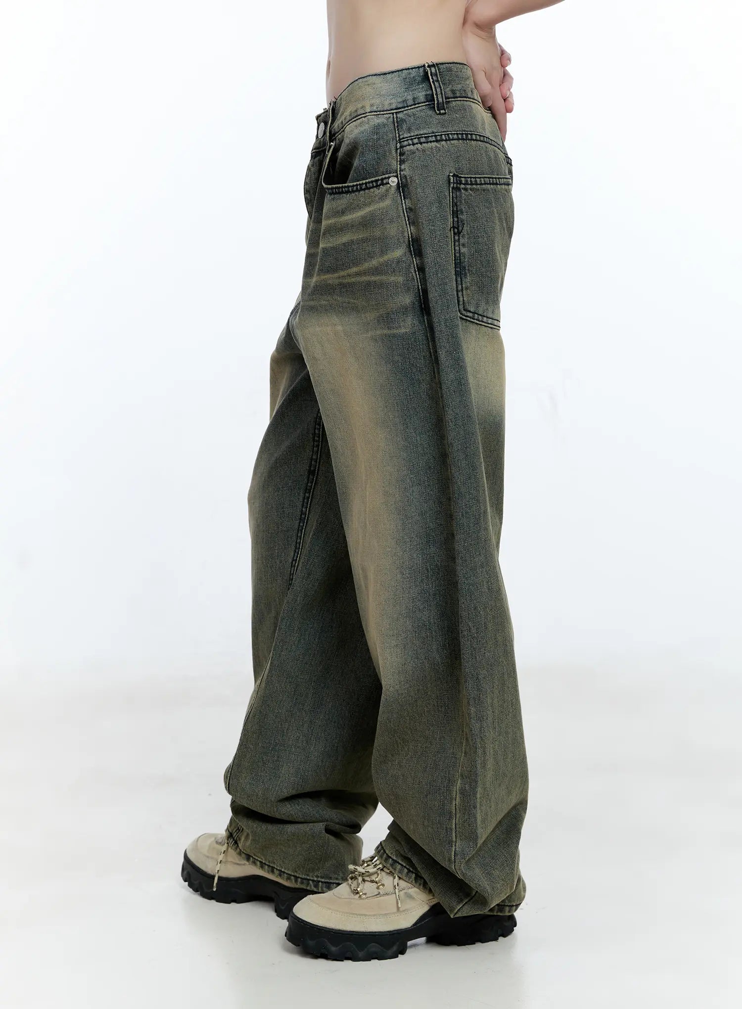 Yeonsoo Vintage-Wash Wide-Leg Jeans CG507 in vintage blue, side view on model, showing side seam and back pocket detail, yellow-green vintage wash, extra-wide leg drape.
