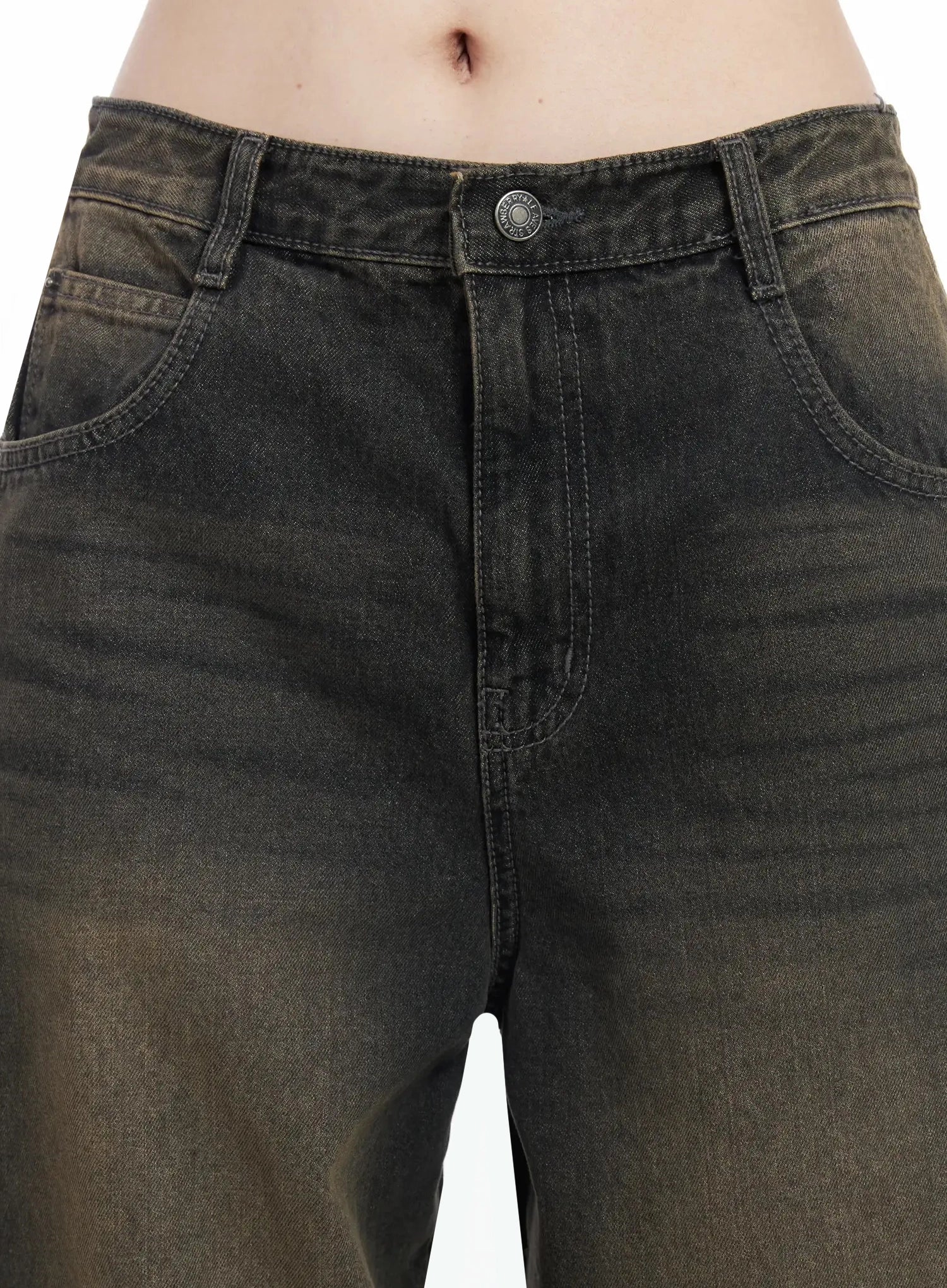 Tracey Vintage Black Washed Wide Leg Jeans IJ528 in black, close-up waistband detail on model, metal button closure, front pockets, vintage brown-fade washed cotton denim texture.