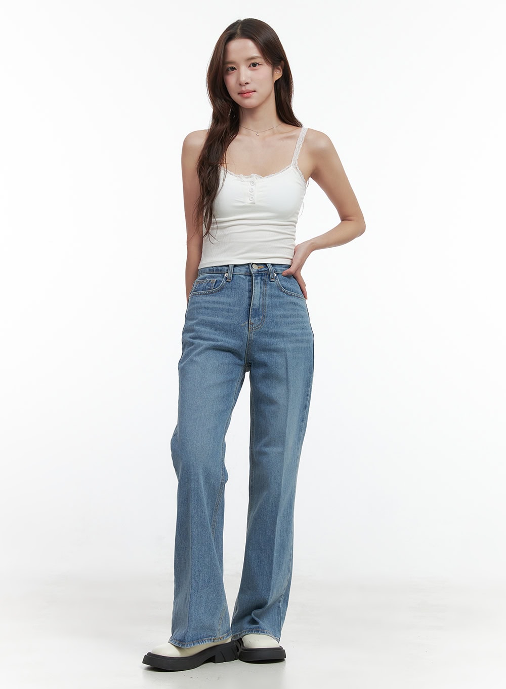 Aubrey Washed Classic Straight-Fit Jeans OO421 in blue, full-length front view on model, high-waist wide straight-fit washed denim, paired with white lace-trim cami top and white chunky loafers.