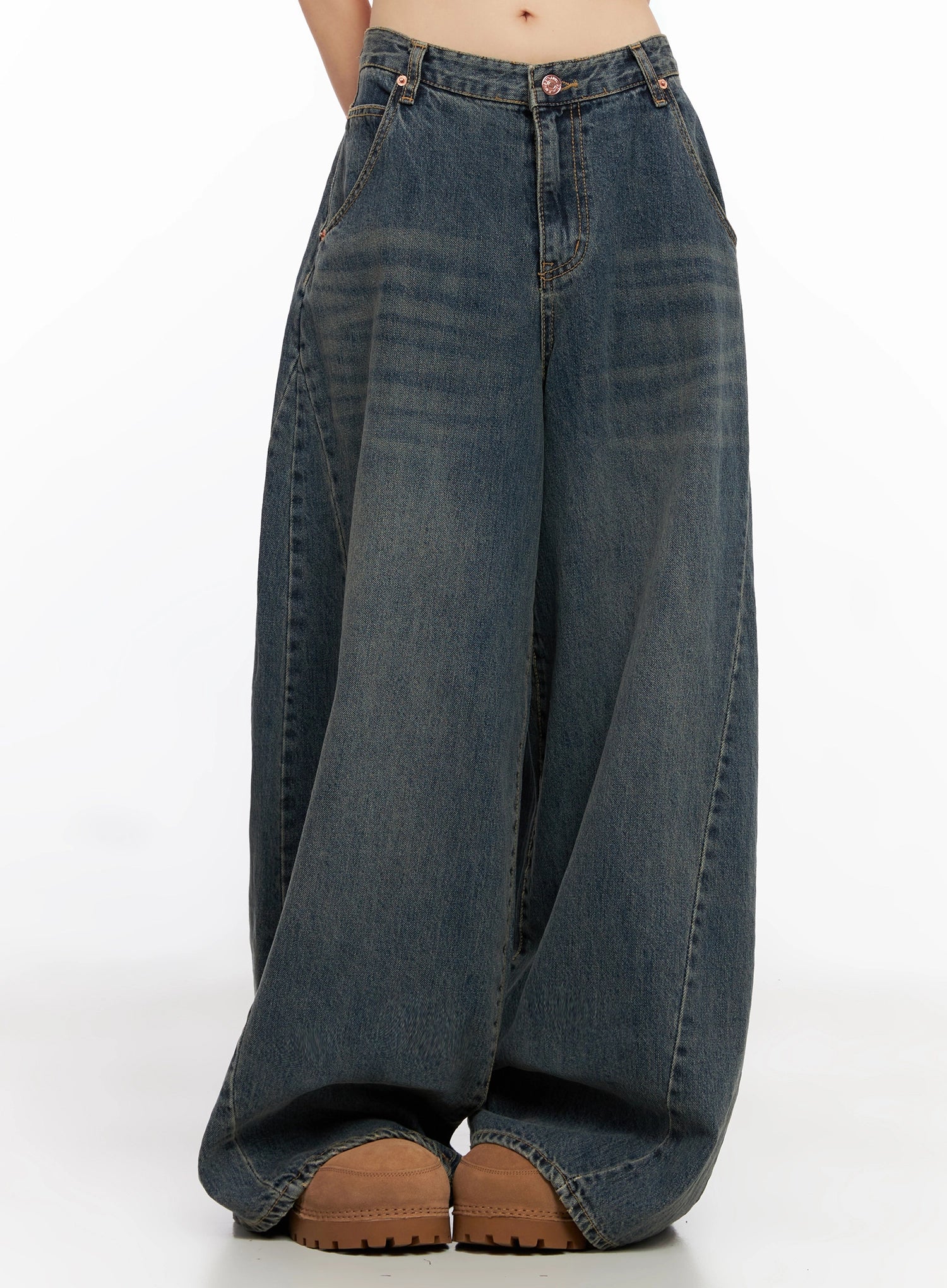 Skyler Washed Balloon Fit Jeans IN503 in blue, close front crop shot waist-to-floor on model, dramatic balloon volume, washed indigo cotton with subtle fading, mid-rise fit.