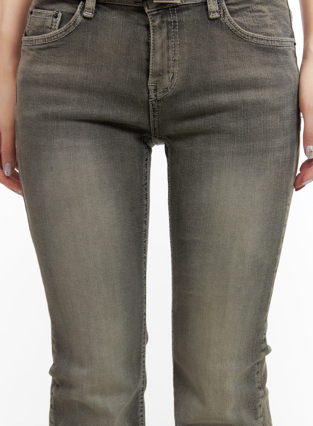 Low Rise Bootcut Jeans CA416 in dark gray, close-up front detail on model, showing low-rise waistband, coin pocket, washed denim texture, and slim fit through the hip.