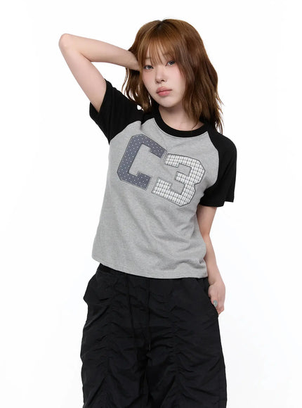 checkered-graphic-short-sleeve-top-ca522