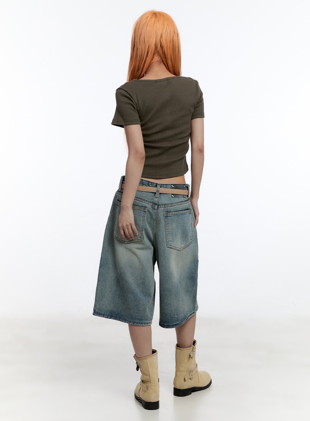 Washed Midi Baggy Jorts CY530 in blue, back view on model, two back pockets with washed fading detail, tan belt, olive crop tee.
