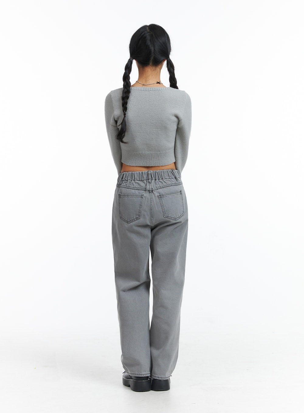Low-Rise Straight Leg Jeans OJ426 in gray, back full-body view on model, showing banded elastic waistband, two back pockets with stitching, wide straight leg washed cotton denim.