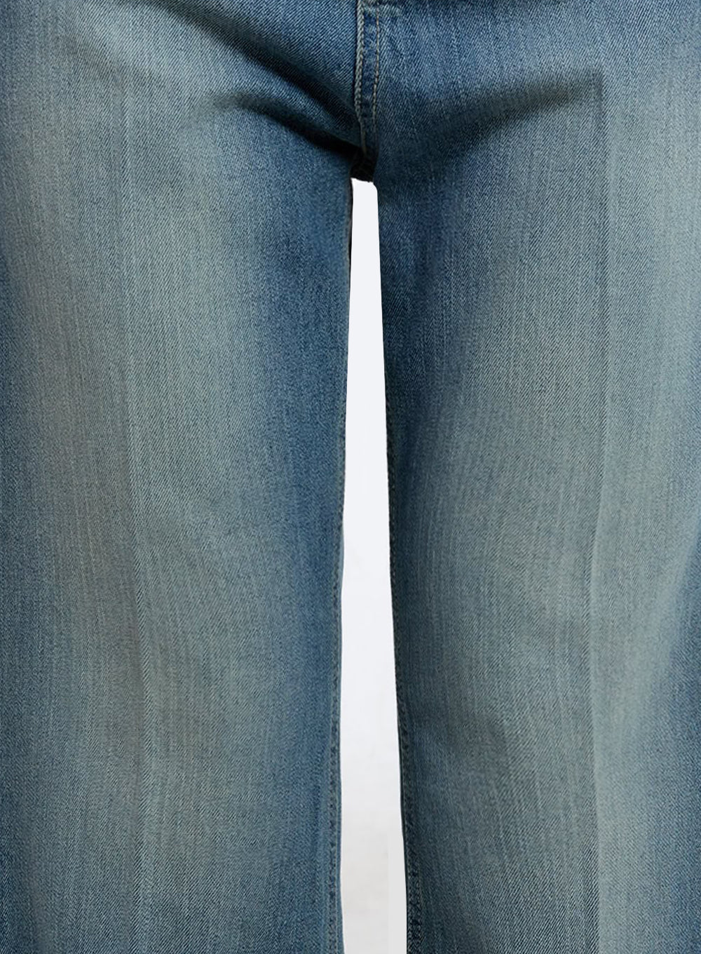 Aliya Washed Bootcut Jeans IU503 in dark blue, extreme close-up macro shot of denim fabric texture, showing washed cotton weave and faded gradient detail at thigh.