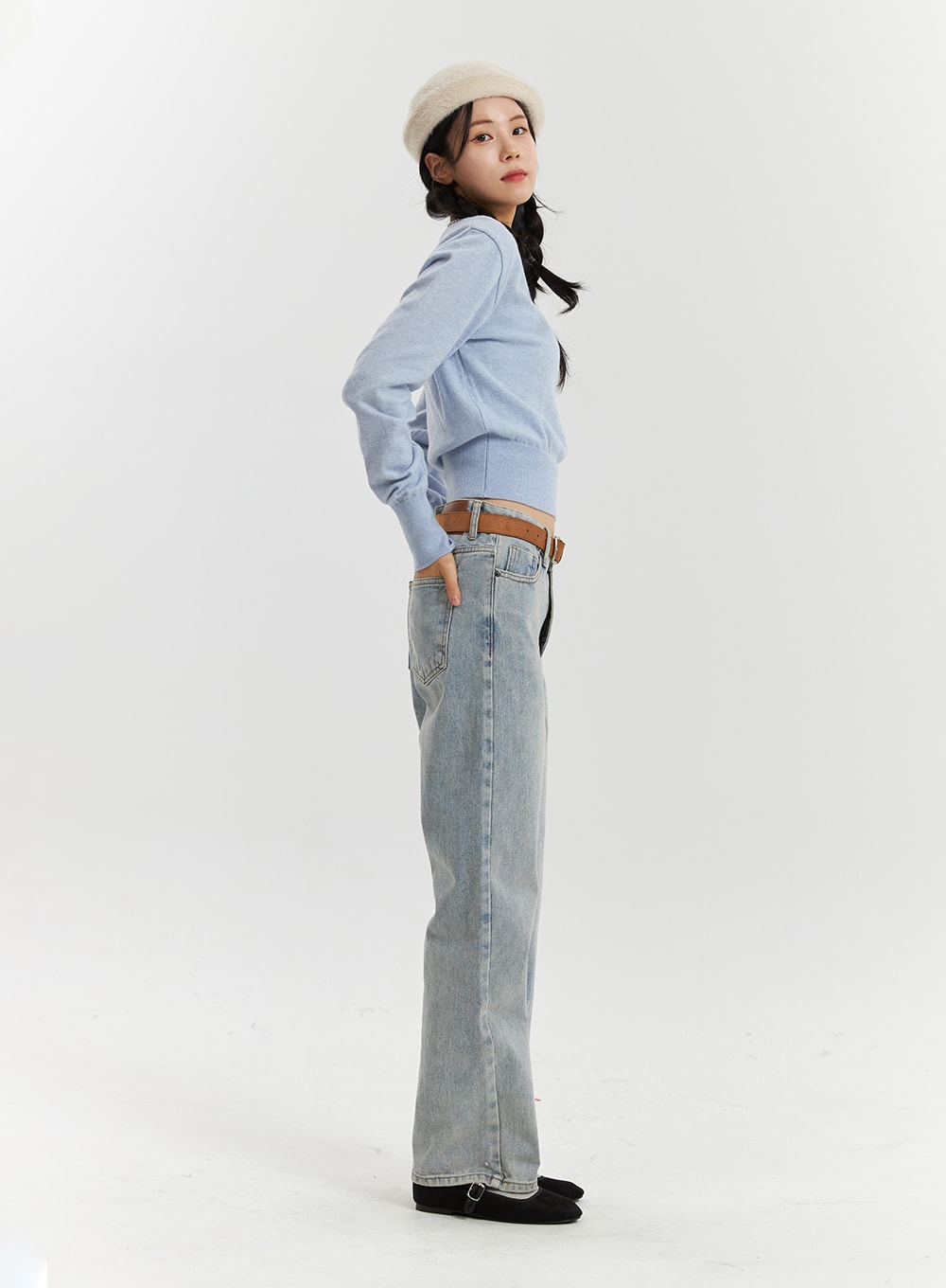 High-Waisted Full-Length Straight Leg Jeans OD320 in light blue, full-body side profile on model, washed denim straight leg showing full length silhouette, paired with blue knit.