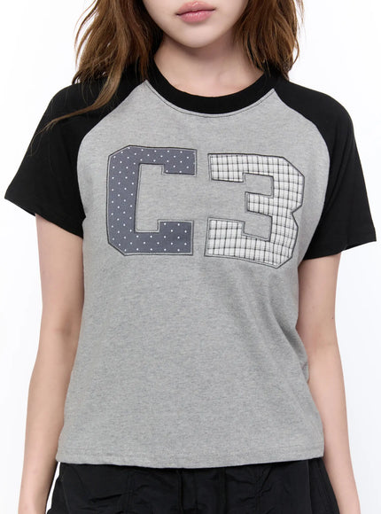 checkered-graphic-short-sleeve-top-ca522